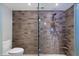 Modern bathroom with large shower and tiled walls at 7840 E Camelback Rd # 111, Scottsdale, AZ 85251