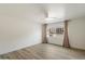 Bright bedroom featuring a large window with neutral curtains at 7840 E Camelback Rd # 111, Scottsdale, AZ 85251