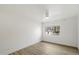 Bright bedroom featuring a large window and ceiling fan at 7840 E Camelback Rd # 111, Scottsdale, AZ 85251