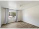 Bright bedroom features a large window with gray curtains at 7840 E Camelback Rd # 111, Scottsdale, AZ 85251