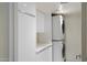 Modern laundry room featuring stacked washer and dryer at 7840 E Camelback Rd # 111, Scottsdale, AZ 85251