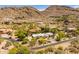 Stunning aerial perspective of desert community with manicured landscaping and mountain views at 7921 N 54Th St, Paradise Valley, AZ 85253