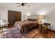 Warm bedroom with decorative rug, stylish bedside tables, and a serene setting at 7921 N 54Th St, Paradise Valley, AZ 85253