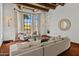 Comfortable living area with natural light, tile floors, and neutral decor at 7921 N 54Th St, Paradise Valley, AZ 85253
