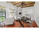 Cozy home office with wooden beamed ceilings, fireplace, and plenty of workspace at 7921 N 54Th St, Paradise Valley, AZ 85253