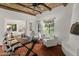 Charming office space with tiled floors, wooden beams, and views to the outside at 7921 N 54Th St, Paradise Valley, AZ 85253