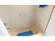 Clean bathroom featuring a built-in tub, grab bar, and tile accents at 8103 E Southern Ave # 154, Mesa, AZ 85209