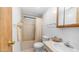 Functional bathroom featuring a tub/shower combination, white toilet and vanity, and a light-colored tile floor at 8103 E Southern Ave # 154, Mesa, AZ 85209