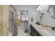 Bathroom features a double vanity, tub-shower combo, and neutral color palette at 8103 E Southern Ave # 222, Mesa, AZ 85209