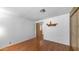 Neutral room features hardwood floors and a small display shelf at 8103 E Southern Ave # 222, Mesa, AZ 85209