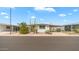 Charming single-story home with desert landscaping, covered parking, and inviting curb appeal at 8103 E Southern Ave # 222, Mesa, AZ 85209