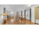 Spacious living room with hardwood floors, natural light, and neutral paint scheme at 8103 E Southern Ave # 222, Mesa, AZ 85209