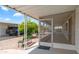 Cozy screened-in patio, providing a peaceful retreat with views of the neighborhood at 8103 E Southern Ave # 222, Mesa, AZ 85209