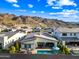 Stunning aerial view of a modern home with a private pool, outdoor patio, and well-manicured landscaping at 830 E Buist Ave, Phoenix, AZ 85042