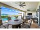 Great outdoor space, featuring a covered patio with a fire pit and a sparkling pool, perfect for entertaining at 830 E Buist Ave, Phoenix, AZ 85042