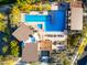 Aerial view of community pool showcasing a lap pool, lounge areas, and modern architecture of surrounding facilities at 830 E Buist Ave, Phoenix, AZ 85042