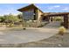 Contemporary two-story home with a modern design and desert landscaping at 830 E Buist Ave, Phoenix, AZ 85042