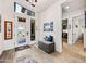 Welcoming foyer with natural light, tile flooring, and a cozy bench at 830 E Buist Ave, Phoenix, AZ 85042