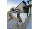 Attractive single-story home showcasing a modern elevation, stone accents, desert landscaping, and a covered patio for outdoor living at 830 E Buist Ave, Phoenix, AZ 85042