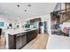 Bright and spacious kitchen with a large island, stainless steel appliances, and pantry at 830 E Buist Ave, Phoenix, AZ 85042