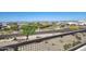 Picturesque neighborhood view showcasing beautiful homes, mature trees, and stunning mountain scenery in the background at 830 E Buist Ave, Phoenix, AZ 85042