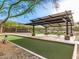 Community recreation area with bocce ball court and picnic tables at 830 E Buist Ave, Phoenix, AZ 85042