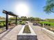 Community walking path with landscaping and seating areas at 830 E Buist Ave, Phoenix, AZ 85042