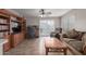 Comfortable living area with an entertainment unit, desk, and comfortable seating with great natural light at 8502 W Pierson St, Phoenix, AZ 85037