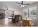 Spacious living area with tile flooring, casual dining and comfortable seating provides relaxation and entertainment at 8502 W Pierson St, Phoenix, AZ 85037