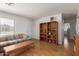 Relaxing living room with hardwood floors and ample space for decor and personal touches at 8502 W Pierson St, Phoenix, AZ 85037