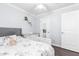 Lovely bedroom featuring a crib, shelving and a dresser at 9167 N 73Rd Ln, Peoria, AZ 85345