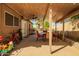 Covered patio featuring a ceiling fan, outdoor seating, and string lights for ambiance at 9167 N 73Rd Ln, Peoria, AZ 85345