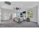 Spacious bedroom with carpet, ceiling fan and natural light at 920 E Leslie E Ave, San Tan Valley, AZ 85140