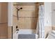 Elegant bathtub and shower with tiled walls at 9451 E Becker Ln # 2004, Scottsdale, AZ 85260