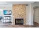 Fireplace in a living room with a wall-mounted TV at 9451 E Becker Ln # 2004, Scottsdale, AZ 85260