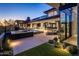 Stunning backyard with a pool, spa, and an outdoor kitchen area, perfect for entertaining at 10283 E Running Deer Trl, Scottsdale, AZ 85262