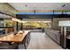 Dining area with backyard view, open layout, and modern design elements, connecting indoor to outdoor space at 10283 E Running Deer Trl, Scottsdale, AZ 85262