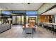 Spacious open-concept area with a dining table, living space, and modern design elements throughout at 10283 E Running Deer Trl, Scottsdale, AZ 85262
