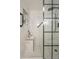 Modern bathroom featuring a glass shower enclosure, marble tile, and a built-in bench at 12222 N Paradise Vlg S Pkwy # 237, Phoenix, AZ 85032