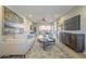 Bright living room features a comfortable couch, stylish decor, and sliding doors to the outdoor patio at 12222 N Paradise Vlg S Pkwy # 237, Phoenix, AZ 85032
