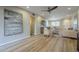 Spacious living room boasts light wood floors, modern decor, and an open layout to the dining area at 12222 N Paradise Vlg S Pkwy # 237, Phoenix, AZ 85032