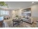 Cozy living room with comfortable seating, modern decor, and an adjacent dining area at 12222 N Paradise Vlg S Pkwy # 237, Phoenix, AZ 85032