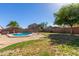 Backyard featuring a private pool and desert landscaping at 12571 W Clarendon Ave, Avondale, AZ 85392