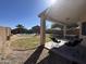 Covered patio with furniture overlooking a pool at 12571 W Clarendon Ave, Avondale, AZ 85392