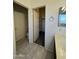 Bathroom view with tile flooring, walk-in closet and toilet room at 12571 W Clarendon Ave, Avondale, AZ 85392