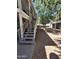 Exterior view of the building with stairs and landscaping, providing a peaceful outdoor environment at 1336 E Mountain View Rd # 209, Phoenix, AZ 85020