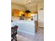Bright kitchen with light wood cabinets, white countertops and stainless steel faucet at 1384 E Las Colinas Dr, Chandler, AZ 85249