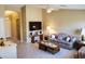 Inviting living room with a ceiling fan, comfortable seating, and ample natural light at 1384 E Las Colinas Dr, Chandler, AZ 85249