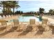 Resort-style community pool with lounge chairs for relaxation at 1384 E Las Colinas Dr, Chandler, AZ 85249
