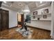 Bright exercise room with recessed lighting, hardwood floors, and large windows at 1423 E Beverly Ln, Phoenix, AZ 85022